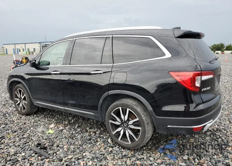 2021 Honda Pilot Touring z USA, uszkodzony, nr VIN 5FNYF6H91MB023351